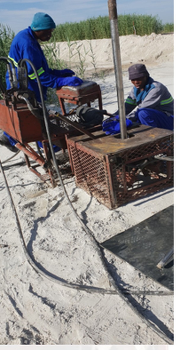 Ukwazi crew working on penstock and grout installation